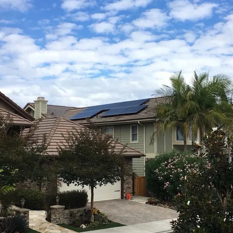 Solar panels installed on the tile roof of a San Diego home